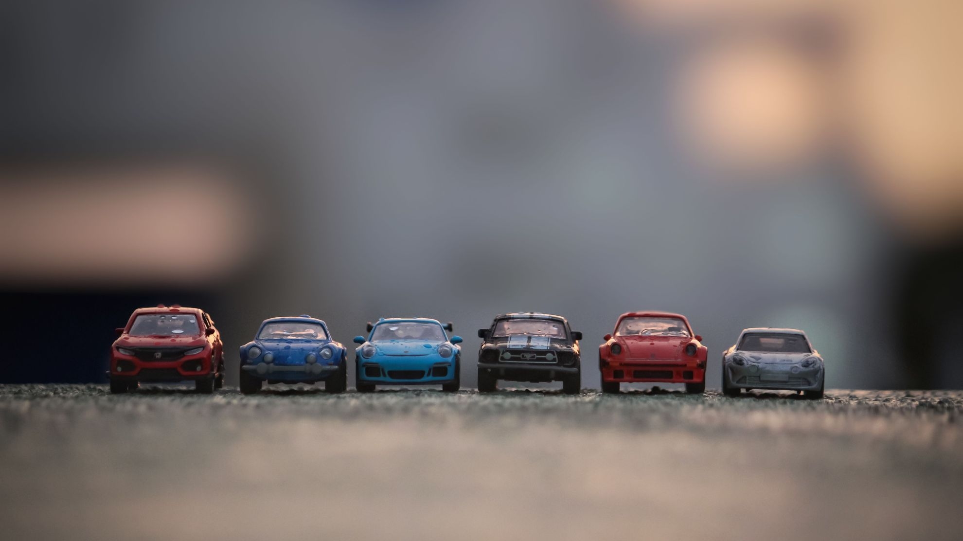 Verschillende modelauto’s als metafoor voor de keuze tussen Payload, WordPress en Drupal